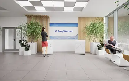 Wnętrze recepcji z industrialnymi elementami, roślinami i nowoczesnym designem.