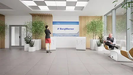 Wnętrze recepcji z industrialnymi elementami, roślinami i nowoczesnym designem.