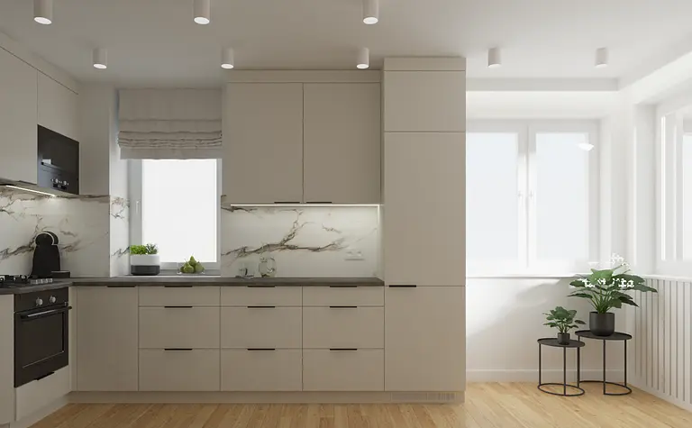 Kuchnia z jasnymi szafkami i marmurowym blatem, nowoczesny design