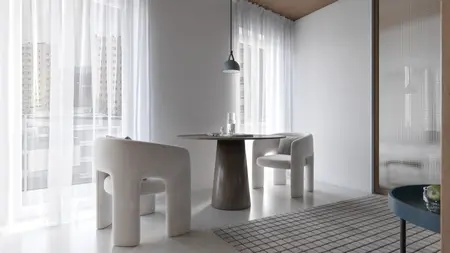 Wnętrze jadalni w stylu boho i minimalistycznym z białymi meblami.