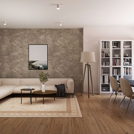 Salon w stylu minimalistycznym z jasną sofą i drewnianymi meblami.