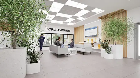 Nowoczesne biuro z szarymi meblami, roślinami i dużymi oknami, styl industrialny