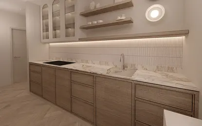 Wnętrze kuchni z drewnianymi meblami i nowoczesnym oświetleniem w stylu quiet luxury.