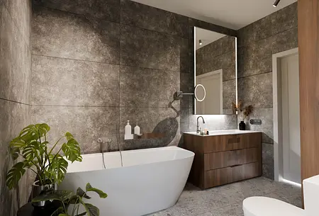 Wnętrze łazienki z wanną, umywalką i rośliną w nowoczesnym stylu.