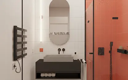 Wnętrze łazienki z czarną umywalką, pomarańczowymi płytkami i nowoczesnym wykończeniem.