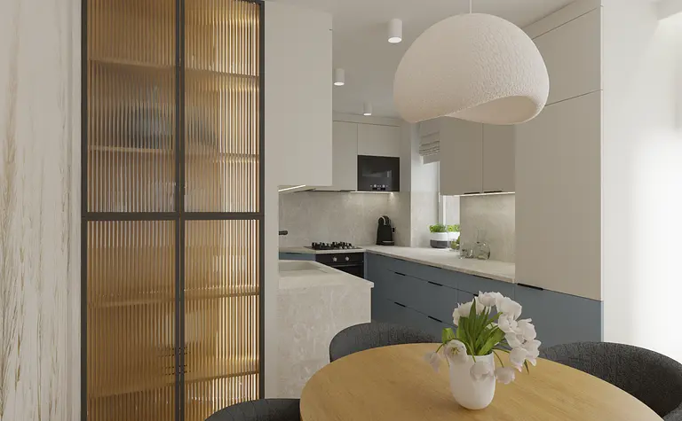 Kuchnia z szarymi meblami, drewnianym blatem i białymi akcentami