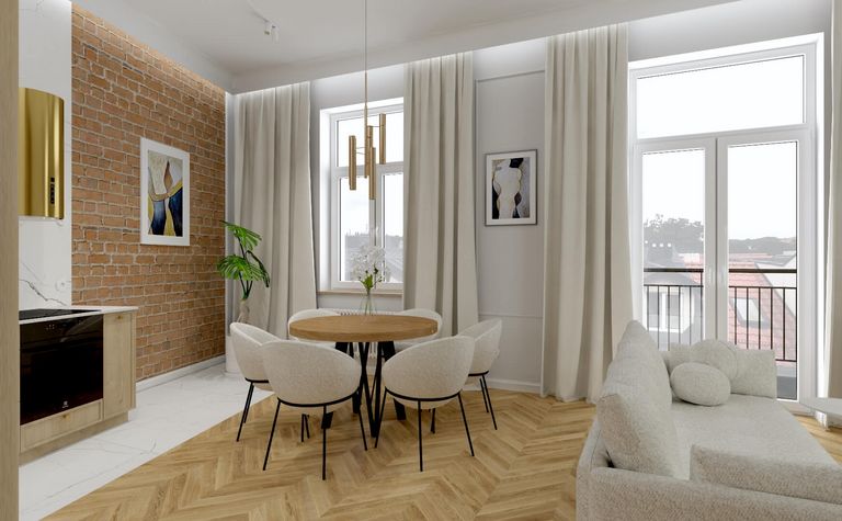 Wnętrze jadalni z drewnianym stołem, jasnymi krzesłami i ceglaną ścianą w stylu quiet luxury.