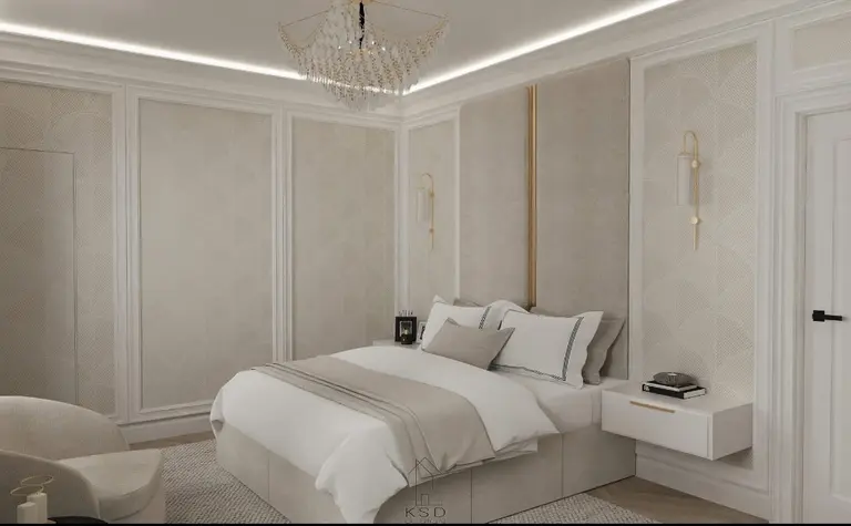 Sypialnia w nowoczesnym stylu z białym łóżkiem i eleganckimi akcentami.