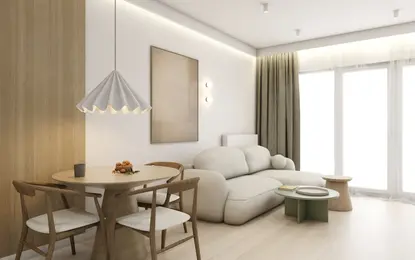 Nowoczesne wnętrze salonu w stylu japandi, minimalistycznym, skandynawskim z beżową sofą.