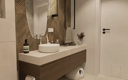 Nowoczesna łazienka z rustykalnymi akcentami, umywalką i drewnianą szafką.