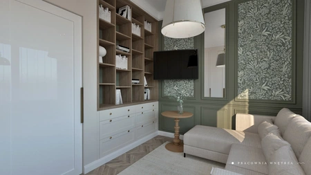 Wnętrze z białą sofą, zieloną ścianą i regałem boho, japandi, minimalistycznym, nowoczesnym, skandynawskim, współczesnym.