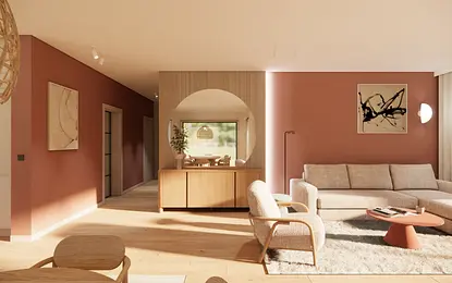 Salon w stylu boho i skandynawskim z beżową sofą i drewnianymi meblami.