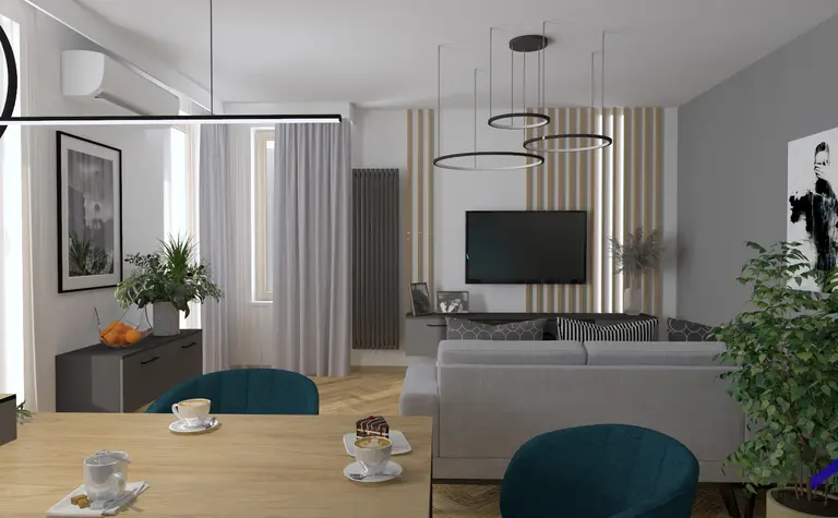 Wnętrze salonu z roślinami, telewizorem i nowoczesnymi elementami decoru.