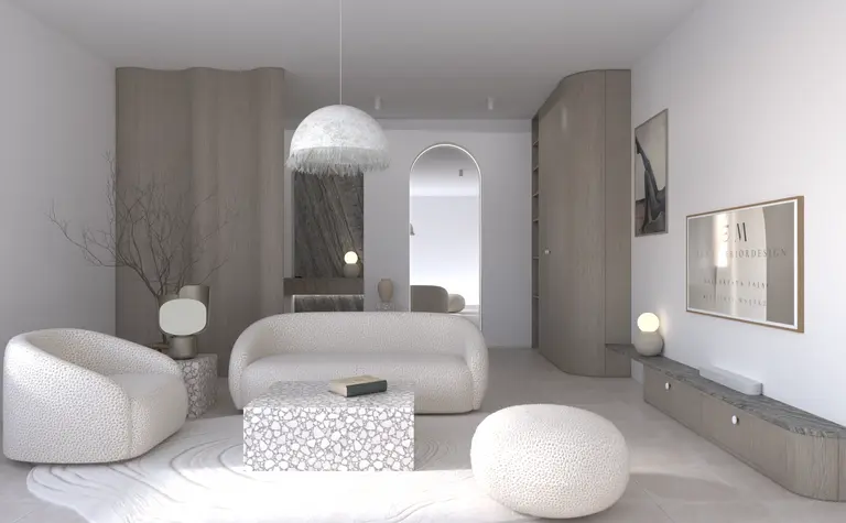 Wnętrze salonu w stylu japandi z białymi meblami i drewnianymi detalami.