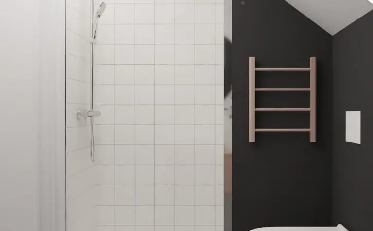 Nowoczesna łazienka z minimalistycznym prysznicem i czarną ścianą.