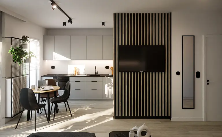Wnętrze kuchni w stylu industrialnym i nowoczesnym z szarymi meblami.