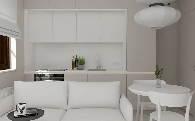 Wnętrze kuchni z białymi meblami i nowoczesnym oświetleniem, styl współczesny.