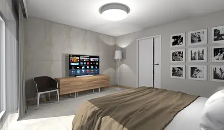 Wnętrze sypialni z telewizorem, drewnianą komodą i minimalistycznymi akcentami.