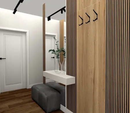 Przedpokój z drewnianymi detalami, lustrem i rośliną w nowoczesnym stylu