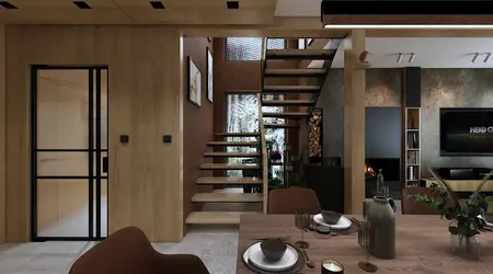 Wnętrze z drewnianymi schodami, szklanymi drzwiami i nowoczesnym wystrojem w stylu industrialnym.
