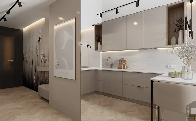 Wnętrze kuchni w stylu glamour i nowoczesnym z beżowymi meblami.