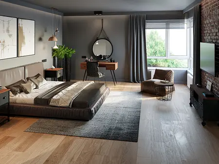 Wnętrze sypialni w stylu industrialnym i soft minimalizm z szarymi ścianami i drewnianą podłogą