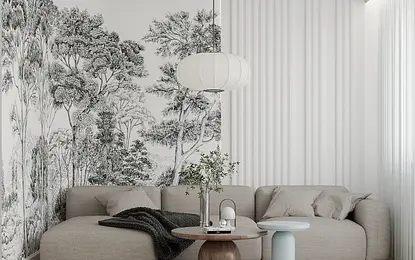 Wnętrze salonu w stylu eklektycznym z białymi zasłonami i szarym narożnikiem.