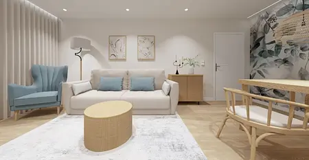 Wnętrze salonu w stylu boho i japandi, z białą sofą, niebieskim fotelem i drewnianymi elementami.