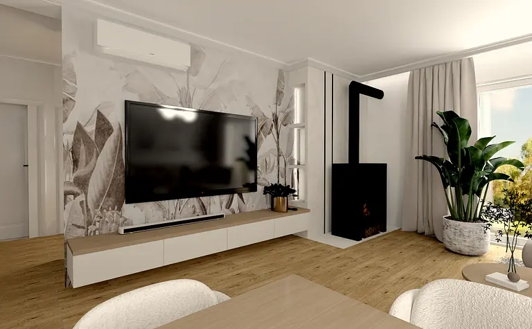 Wnętrze salonu z telewizorem, drewnianą podłogą i roślinami.