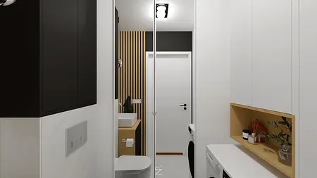 Minimalistyczna łazienka z białymi meblami i nowoczesnymi akcentami.