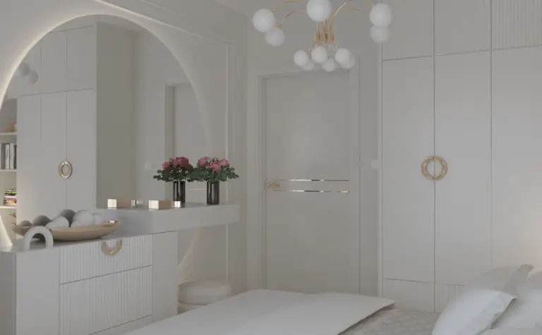 Sypialnia w stylu glamour i nowoczesnym z białymi meblami i złotymi detalami.