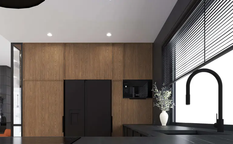 Wnętrze kuchni w stylu industrialnym i minimalistycznym z drewnianymi elementami.