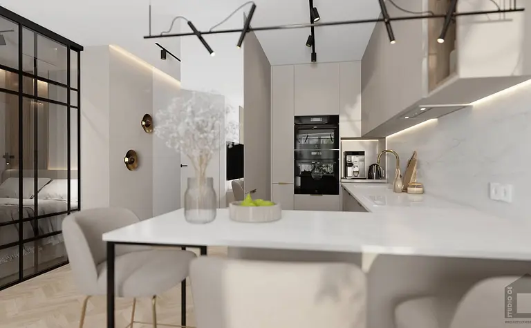 Wnętrze kuchni z nowoczesnymi meblami i dodatkami w stylu glamour i industrialnym.