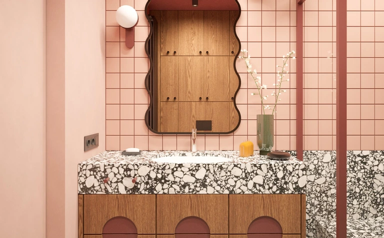 Wnętrze łazienki w stylu art deco z marmurowym blatem i drewnianymi meblami.