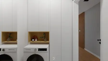 Przestrzeń z białymi szafkami i pralką w stylu minimalistycznym i nowoczesnym.
