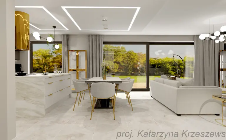 Wnętrze kuchni z białymi meblami, złotymi detalami i minimalistycznym designem.
