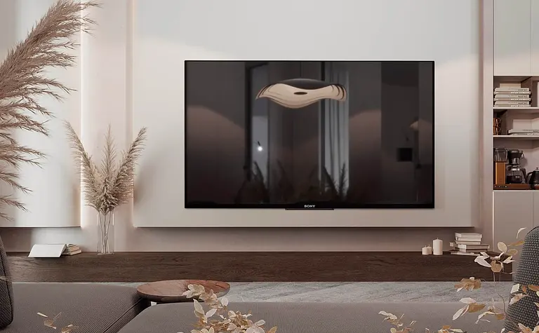 Minimalistyczne wnętrze salonu z telewizorem i roślinami dekoracyjnymi.