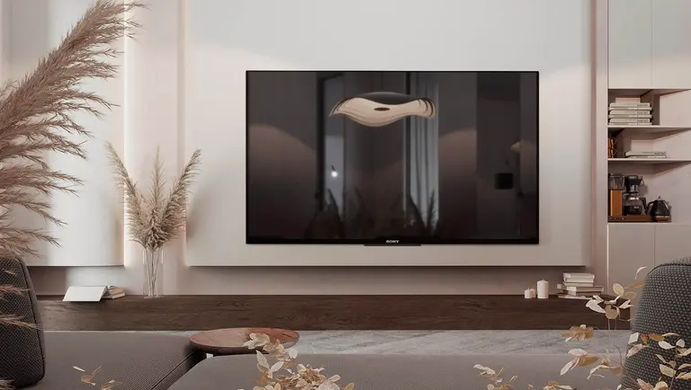 Minimalistyczne wnętrze salonu z telewizorem i roślinami dekoracyjnymi.