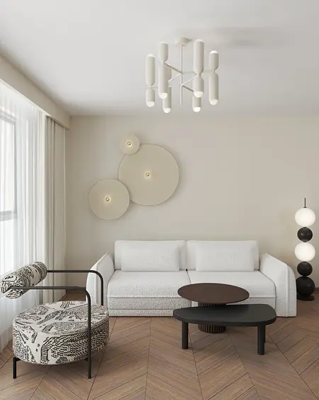 Wnętrze salonu z nowoczesną sofą i designerskimi lampami.