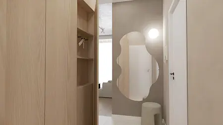 Przedpokój w stylu japandi, minimalistycznym, współczesnym z drewnem i lustrem.