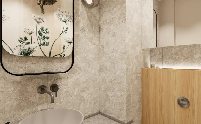 Wnętrze łazienki z kamiennymi ścianami, okrągłą umywalką i drewnianymi detalami. Styl boho, japandi, minimalizm.