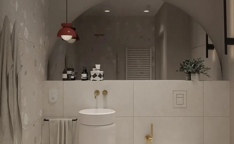 Nowoczesna łazienka z białą ceramiką i złotymi detalami