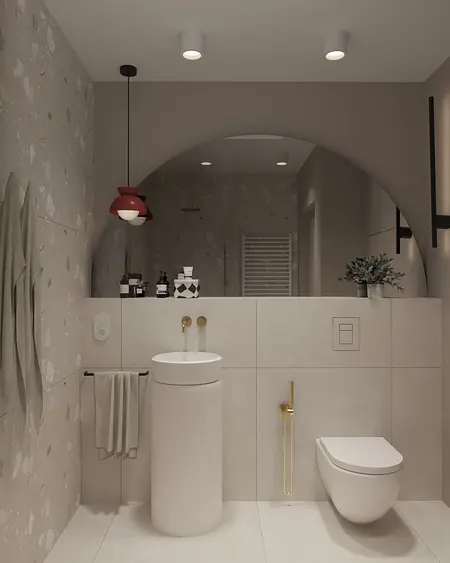 Nowoczesna łazienka z białą ceramiką i złotymi detalami
