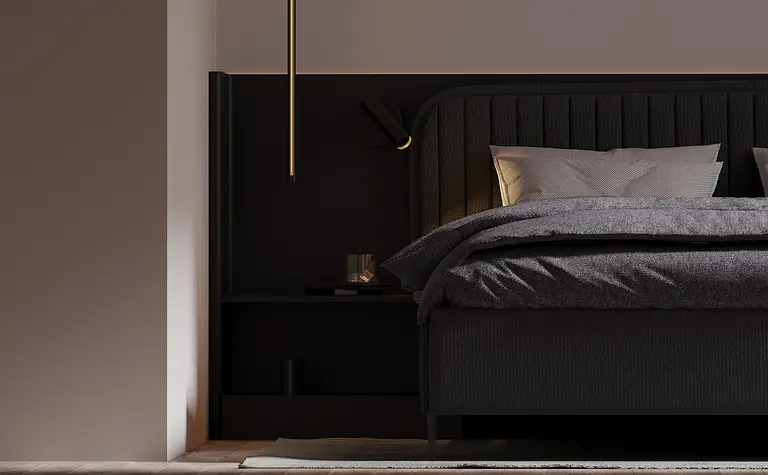 Sypialnia minimalistyczna z ciemnym łóżkiem i szarymi tekstyliami.