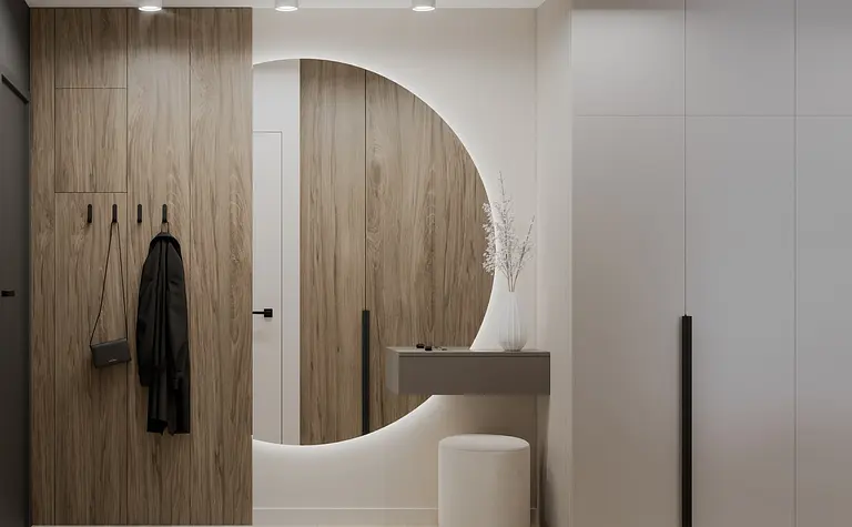 Nowoczesny przedpokój z minimalistycznym designem, drewnianymi elementami i białymi dekoracjami.