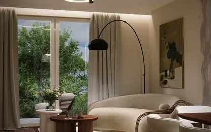 Wnętrze salonu w stylu boho, japandi i minimalistycznym z beżową sofą i drewnianymi meblami.