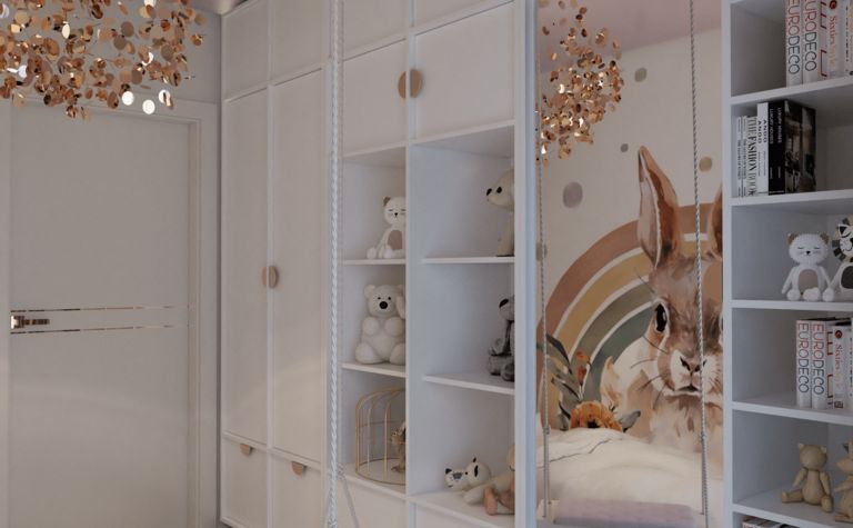 Pokój dziecięcy z białymi meblami, złotymi akcentami i dekoracjami w stylu glamour i nowoczesnym.