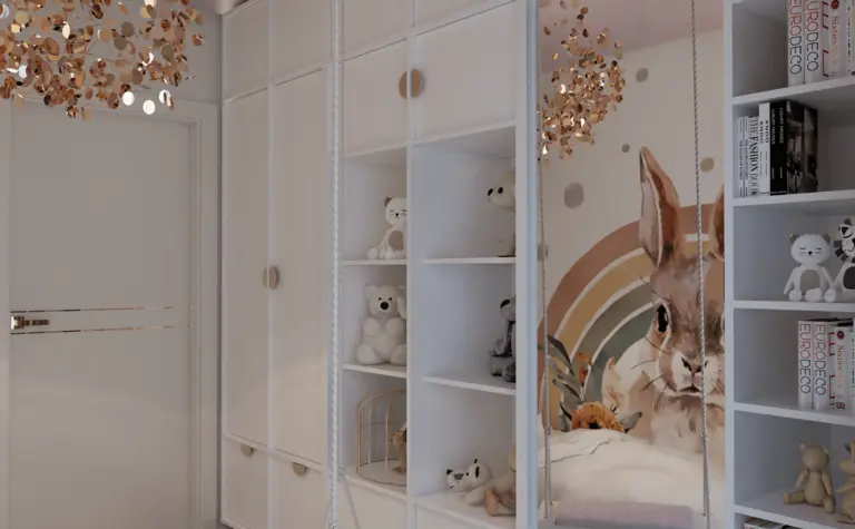 Pokój dziecięcy z białymi meblami, złotymi akcentami i dekoracjami w stylu glamour i nowoczesnym.
