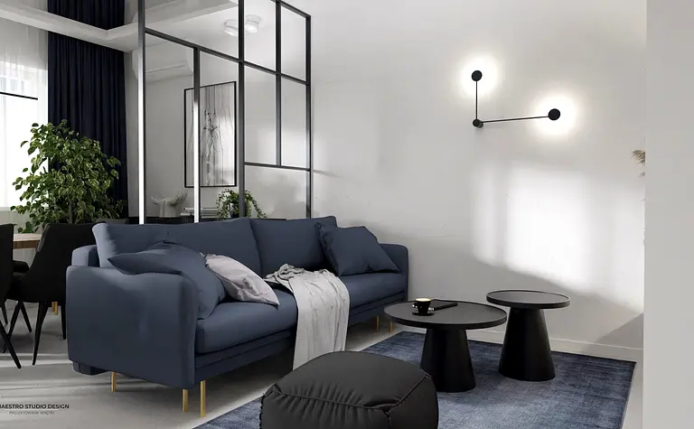 Nowoczesny salon z niebieską sofą, minimalistycznymi meblami i roślinami w stylu industrialnym.