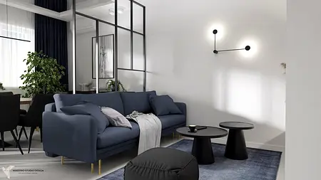 Nowoczesny salon z niebieską sofą, minimalistycznymi meblami i roślinami w stylu industrialnym.